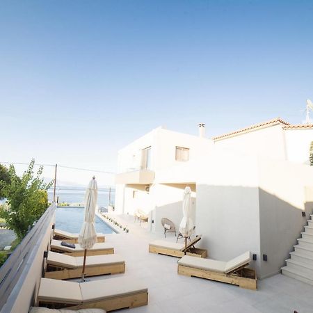 Theros Suites Dhiminio Esterno foto