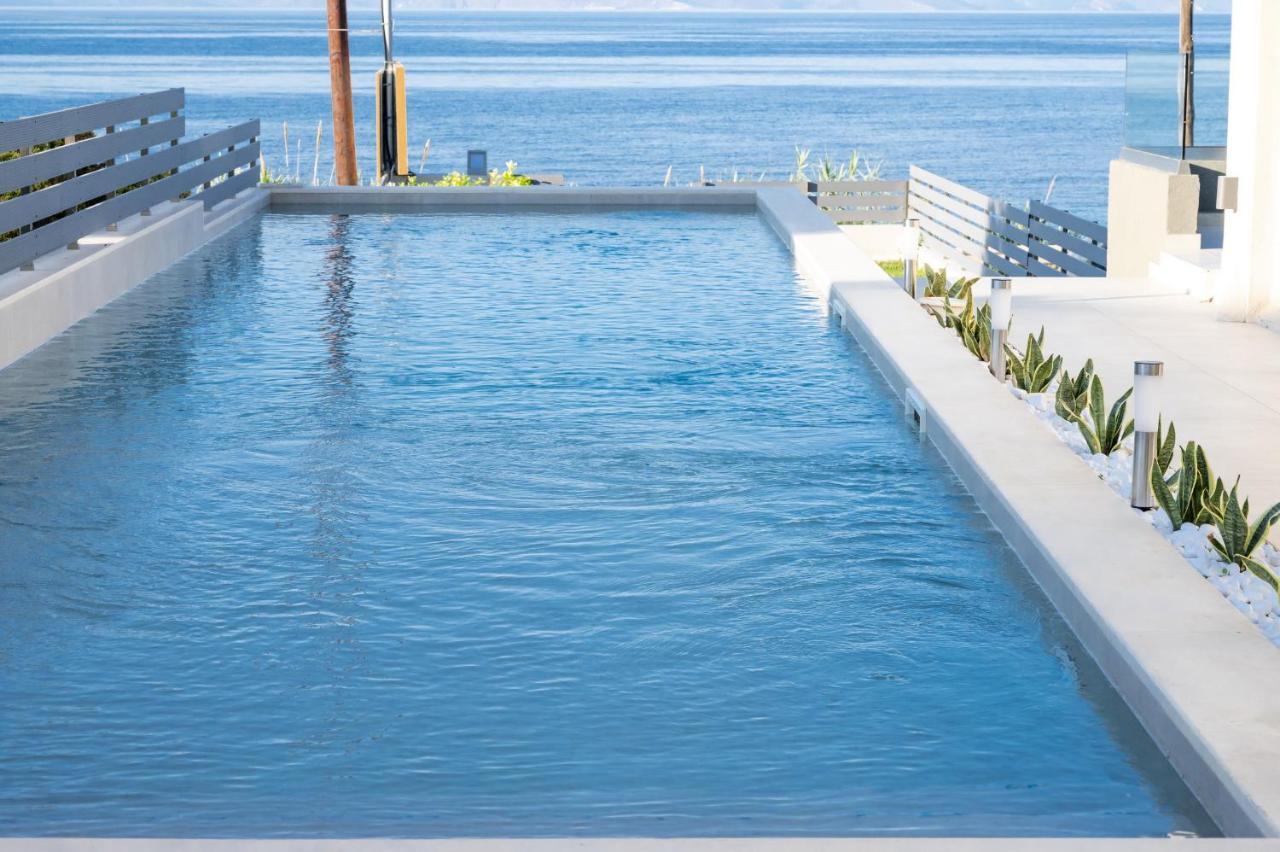 Theros Suites Dhiminio Esterno foto