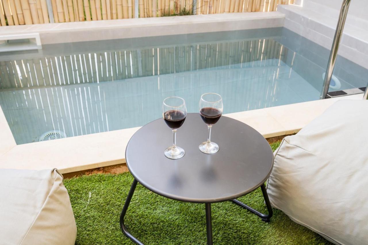 Theros Suites Dhiminio Esterno foto