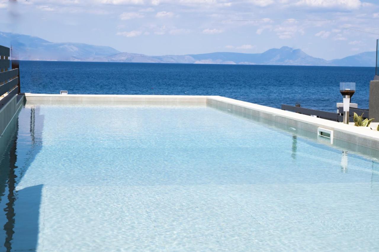 Theros Suites Dhiminio Esterno foto