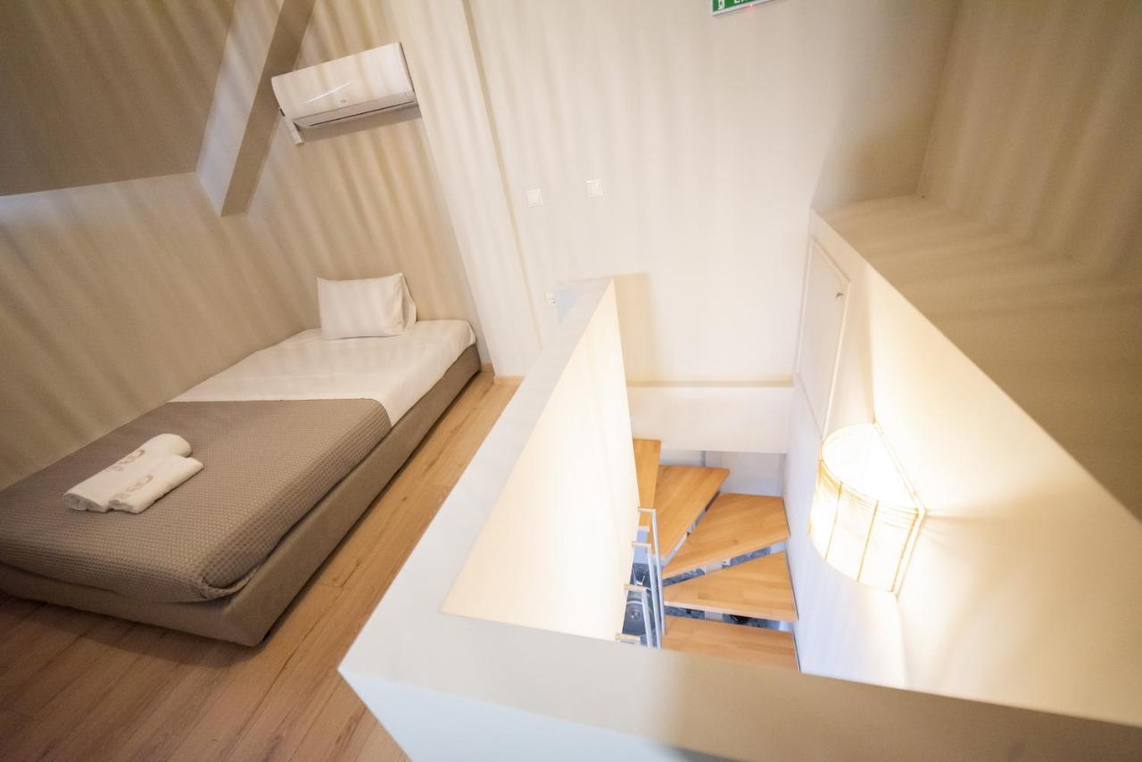 Theros Suites Dhiminio Esterno foto