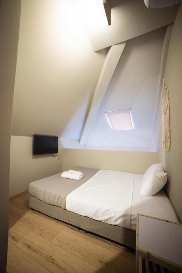 Theros Suites Dhiminio Esterno foto