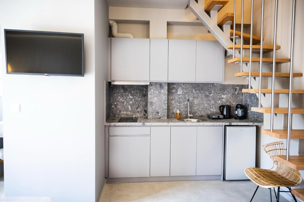 Theros Suites Dhiminio Esterno foto