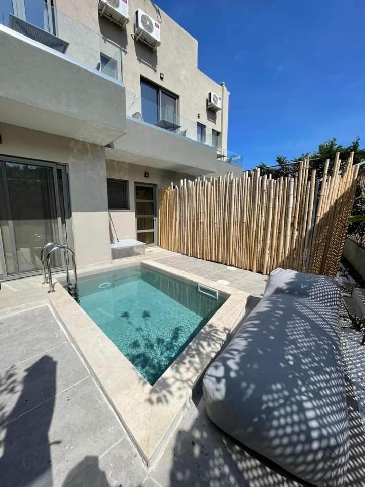 Theros Suites Dhiminio Esterno foto